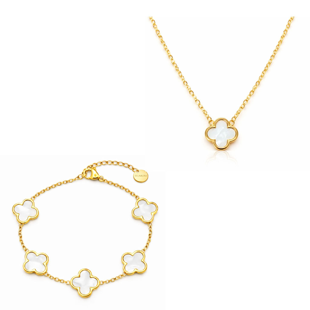 Eternal Bloom Clover Schmuck-Set mit goldfarbener Kette und Armband mit weißem Kleeblatt Design, elegant und zeitlos auf reinweißem Hintergrund.