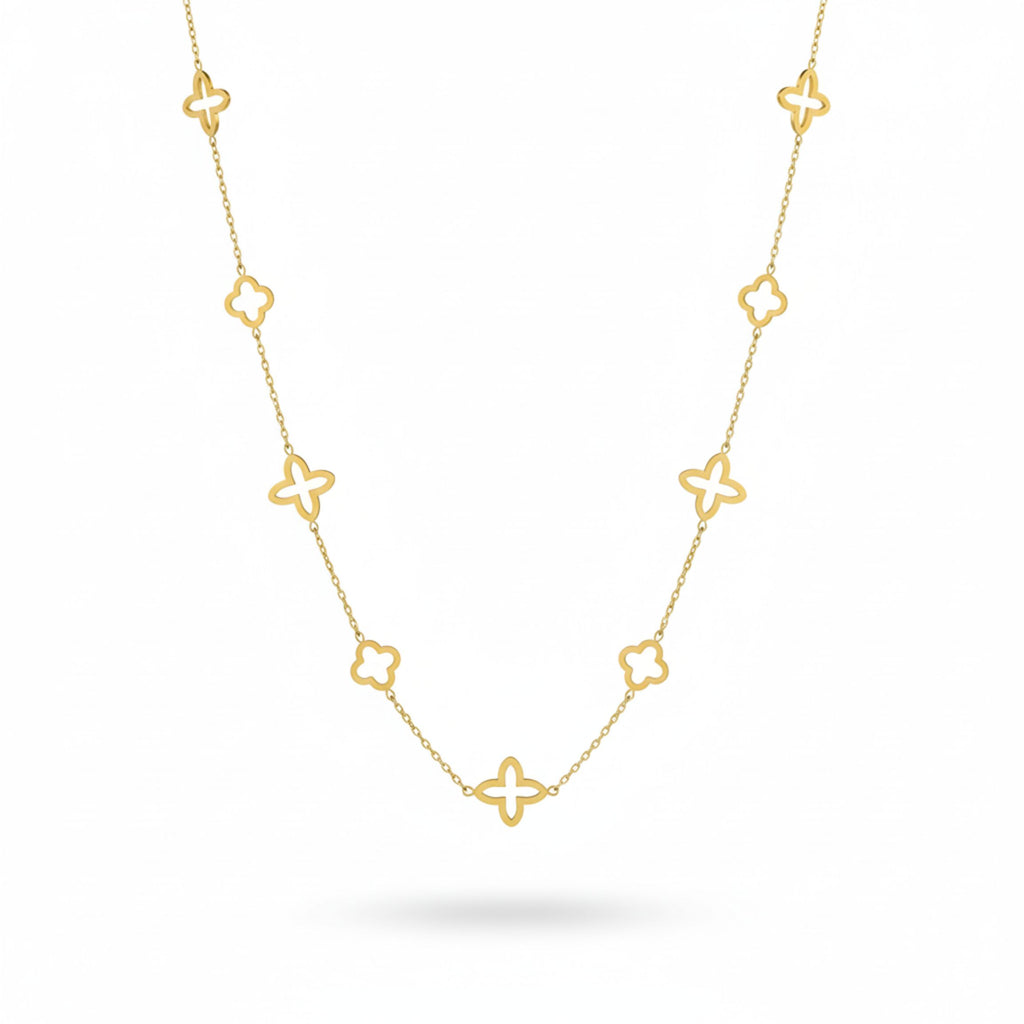 Kleeblatt Halskette in Gold mit filigranen, gleichmäßig verteilten Anhängern, zeitloses Design, eleganter Modeschmuck für Damen