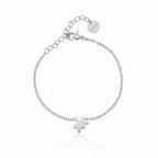 Silbernes Eternité Piece Armband mit Puzzle-Element, elegantes Edelstahlarmband für Damen auf weißem Hintergrund